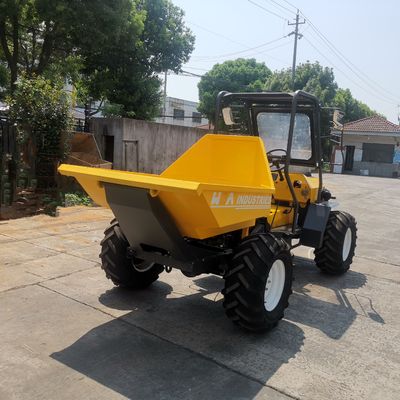 Het gele Rubberterrein van Mini Small Tractors For All van de Spoortractor